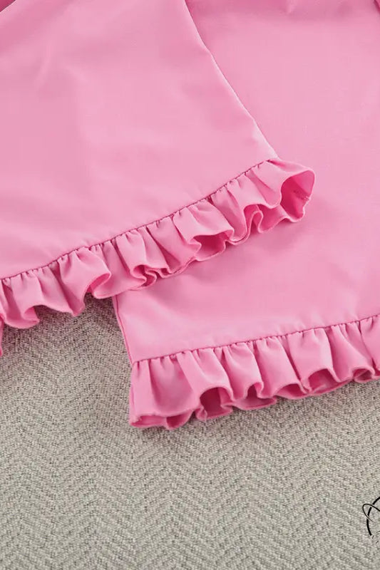 Pink ruffled langry swim trunks in smooth fabric for fashion ملابس