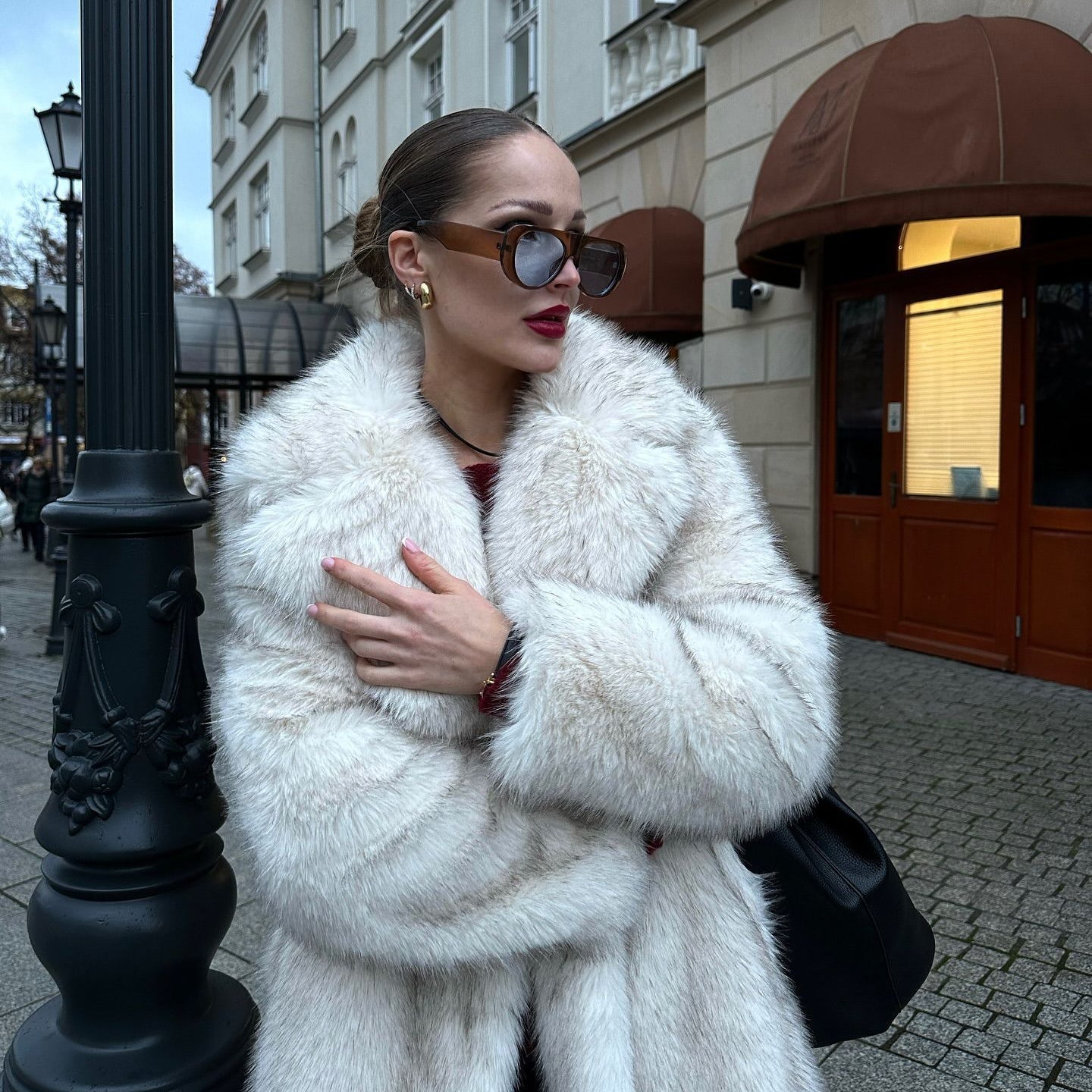 Luxurious white faux fur coat in Langry fashion design