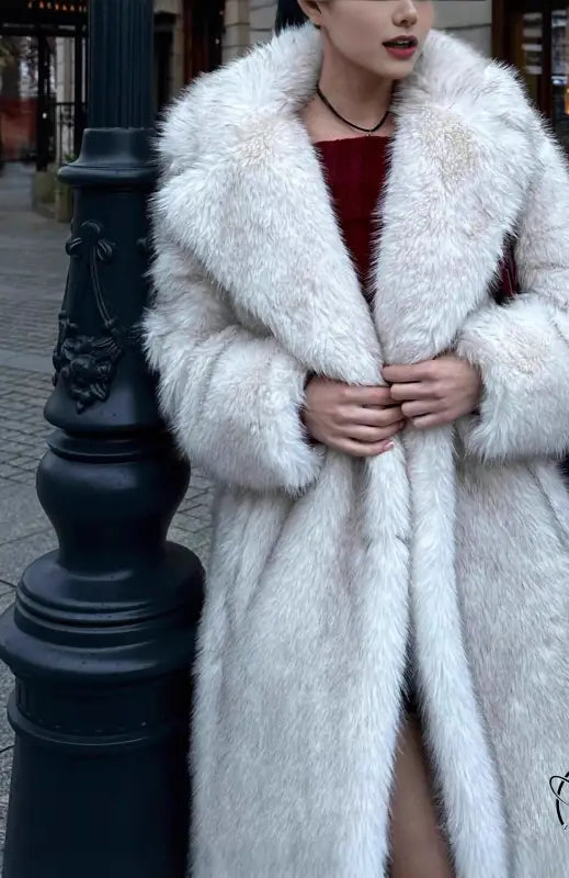 Warm winter faux fur coat with high collar and long sleeves