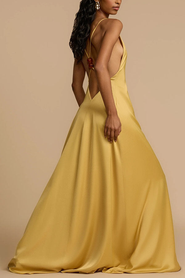 Elegant yellow satin maxi dress showcasing luxurious fashion and langry style