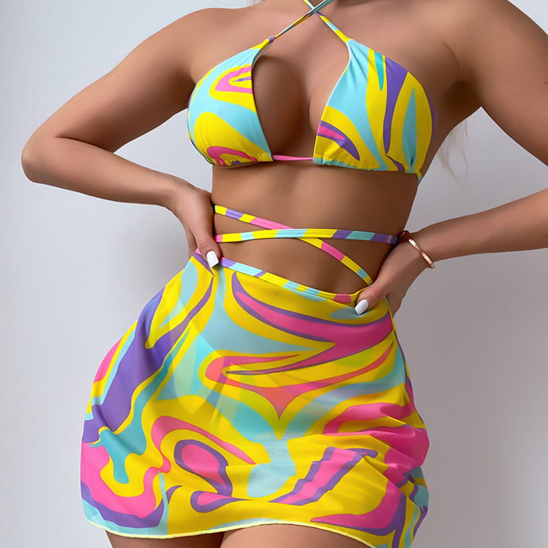 Colorful swirl-patterned bikini and skirt set from Langry fashion ملابس collection