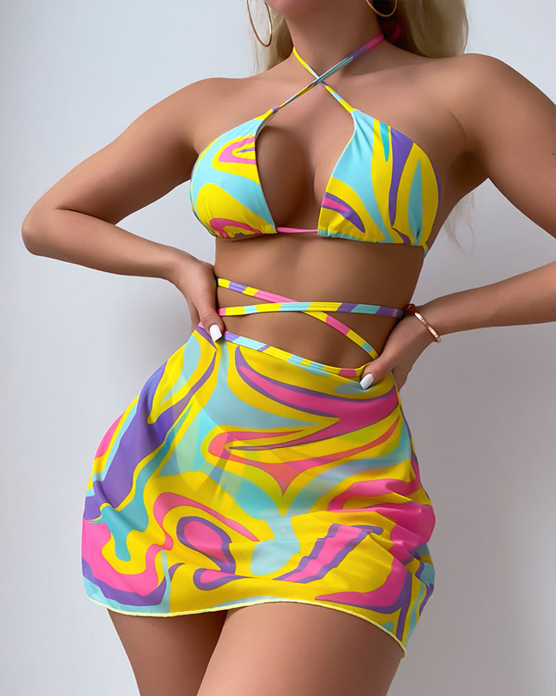 Colorful swirl-patterned bikini and skirt set from Langry fashion ملابس collection