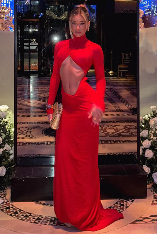Woman in red cutout gown wearing Stunning Cutout Bare Cropped Slim Fit Dress for fashion