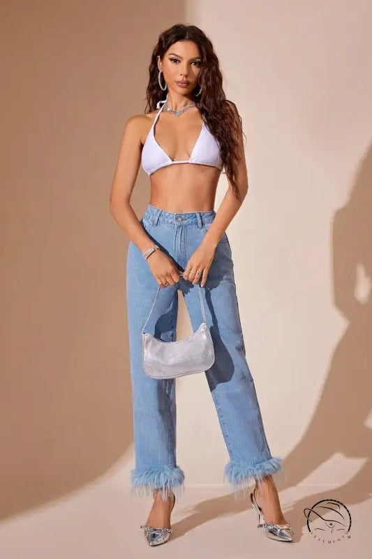 Light wash denim straight leg jeans with furry stitching cuffs