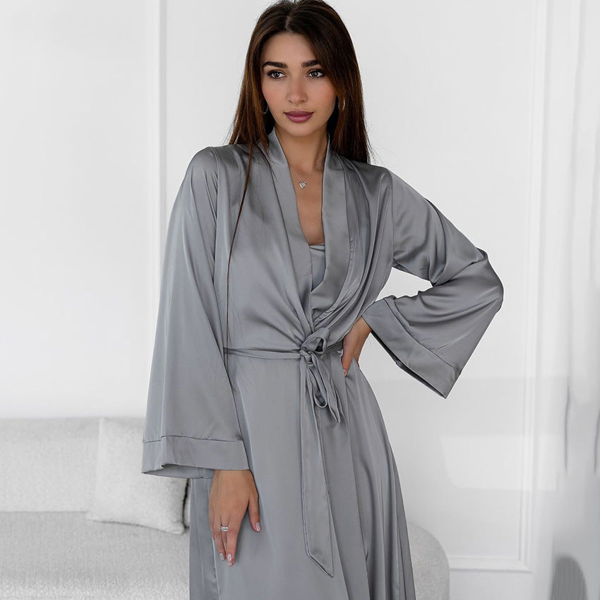 Elegant woman in slate grey satin home wear and slip dress, perfect for luxury fashion