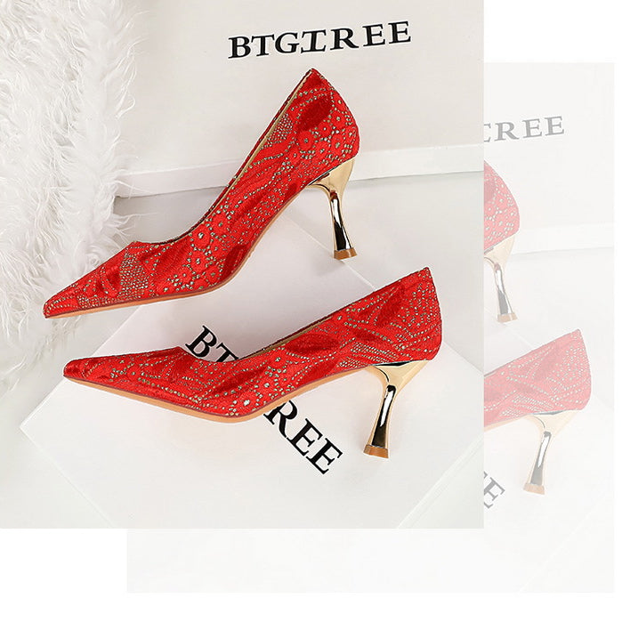 Langry fashion red glitter mid heel pumps with gold accents and tassels