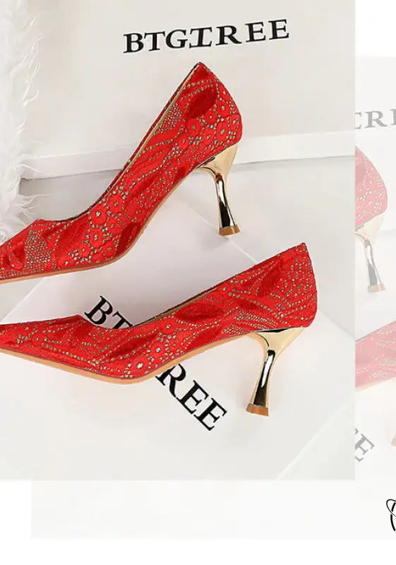 Red glitter langry fashion high heel pumps with gold accents and tassels
