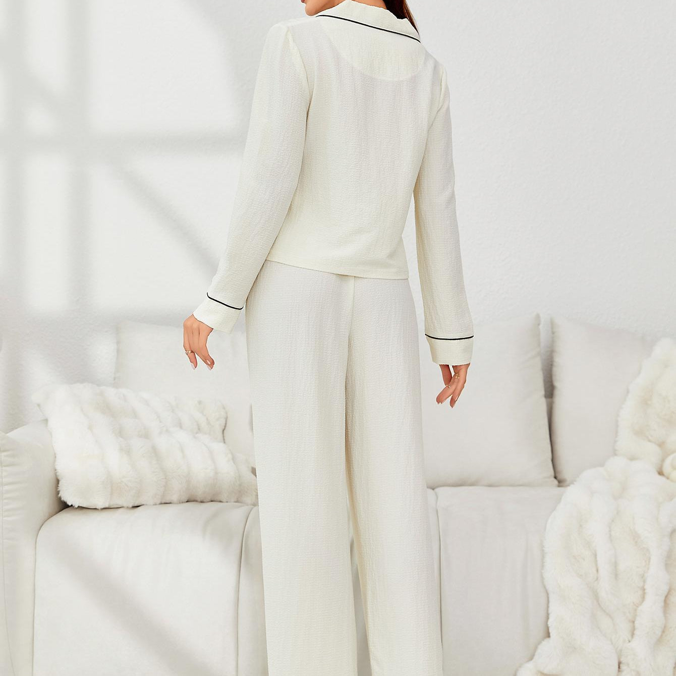 Off-white pajama set with black piping details from Home Wear Autumn Winter collection, stylish ملابس for women