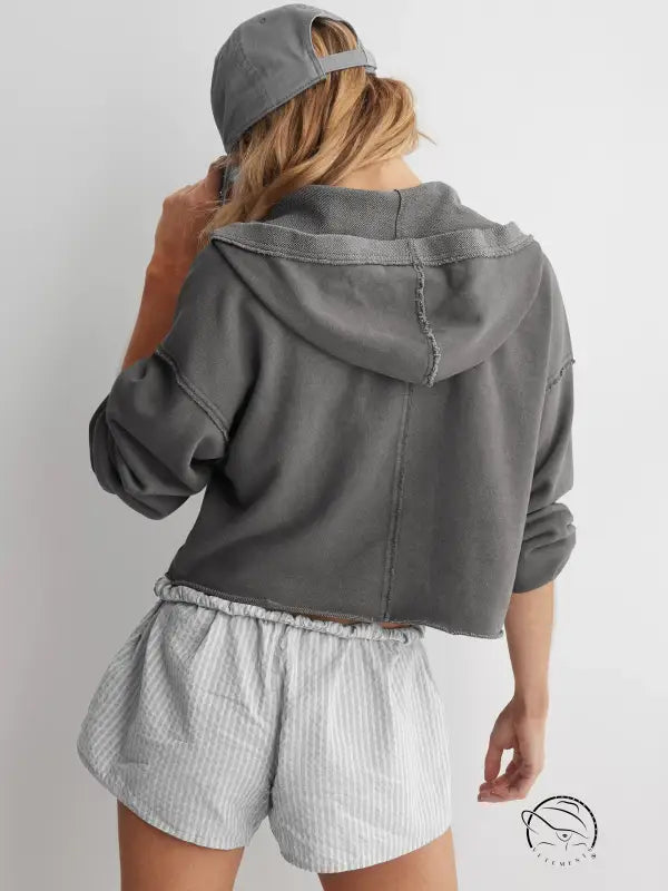 Cozy loose hooded sweatshirt in gray langry fashion with striped shorts