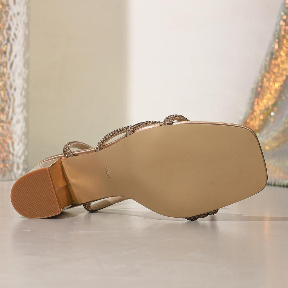 Langry gold metallic ankle strap stiletto heel sandal with chain detailing