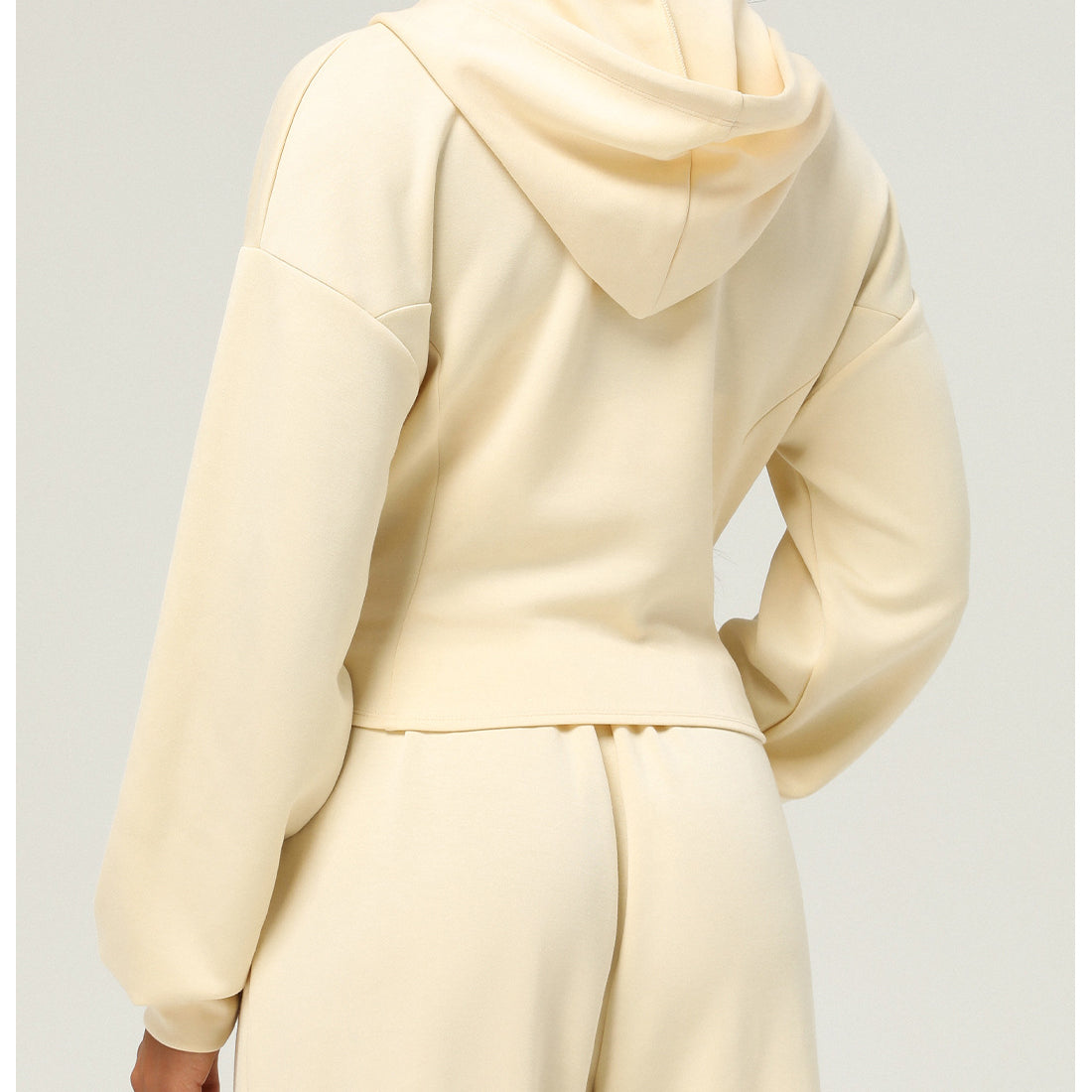 Cream-colored hooded sweatshirt and matching pants from Langry fashion ملابس collection