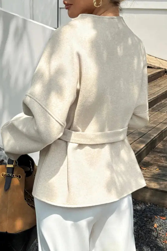 Cream-colored woolen casual holiday strap long sleeve blazer jacket in fashion ملابس