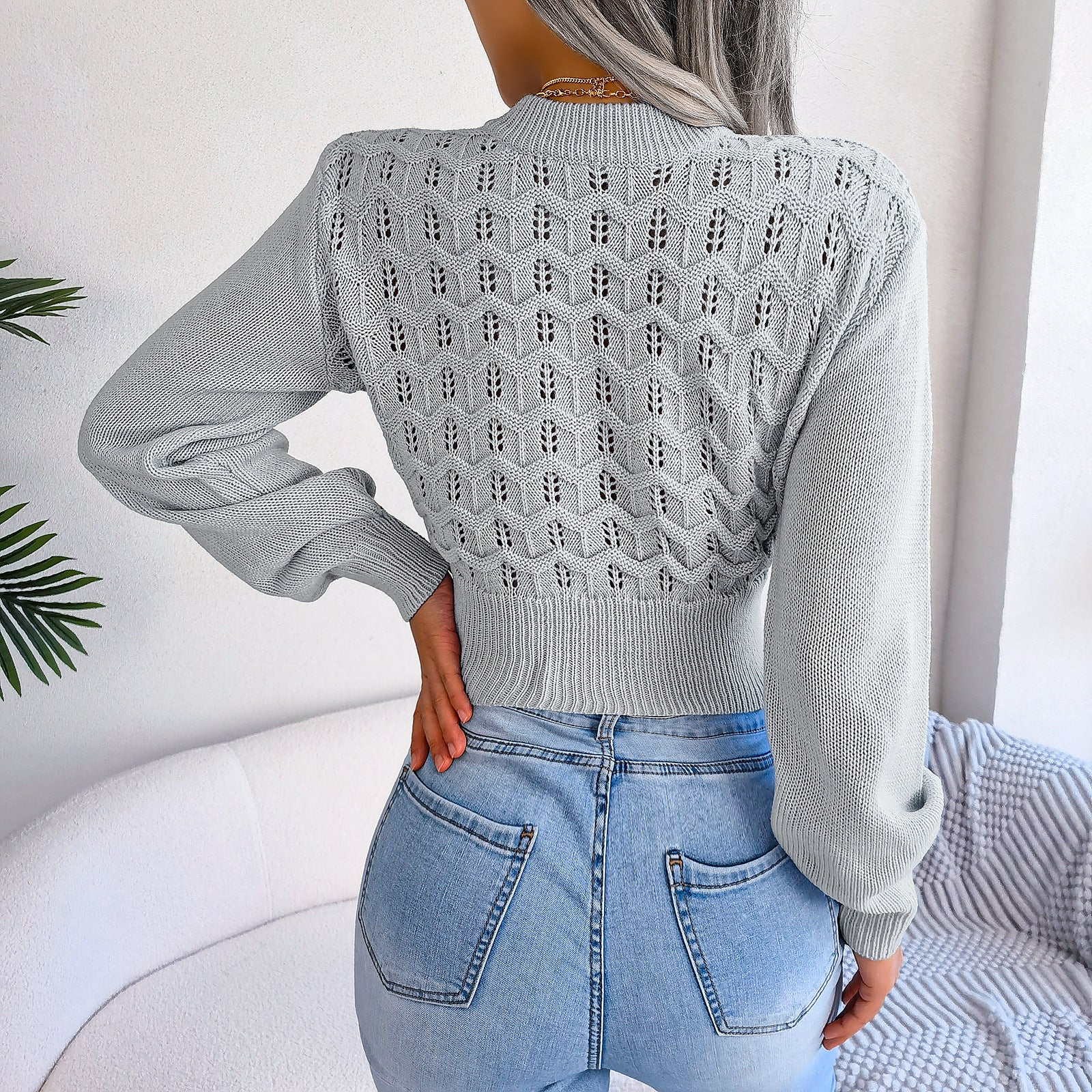 Gray knit Lantern Sleeve Cropped Knitted Sweater featuring an openwork design in fashion