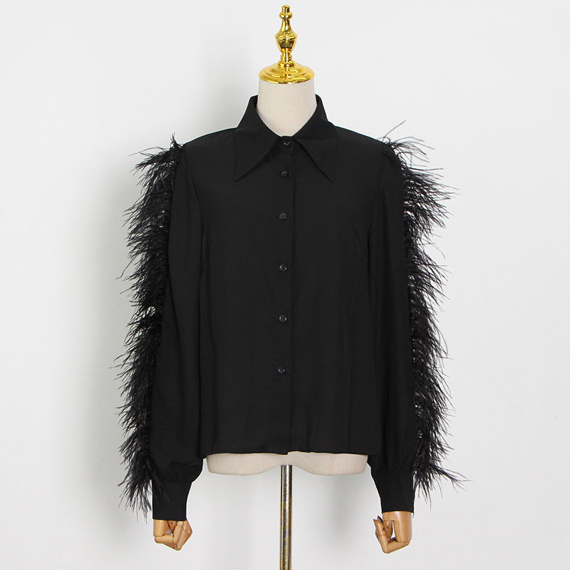Black long sleeve shirt with feather sleeves from Langry fashion collection