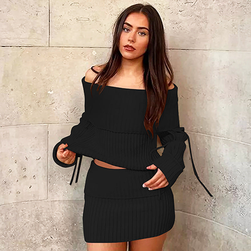 Black off-shoulder crop top and mini skirt two-piece outfit in trendy fashion ملابس