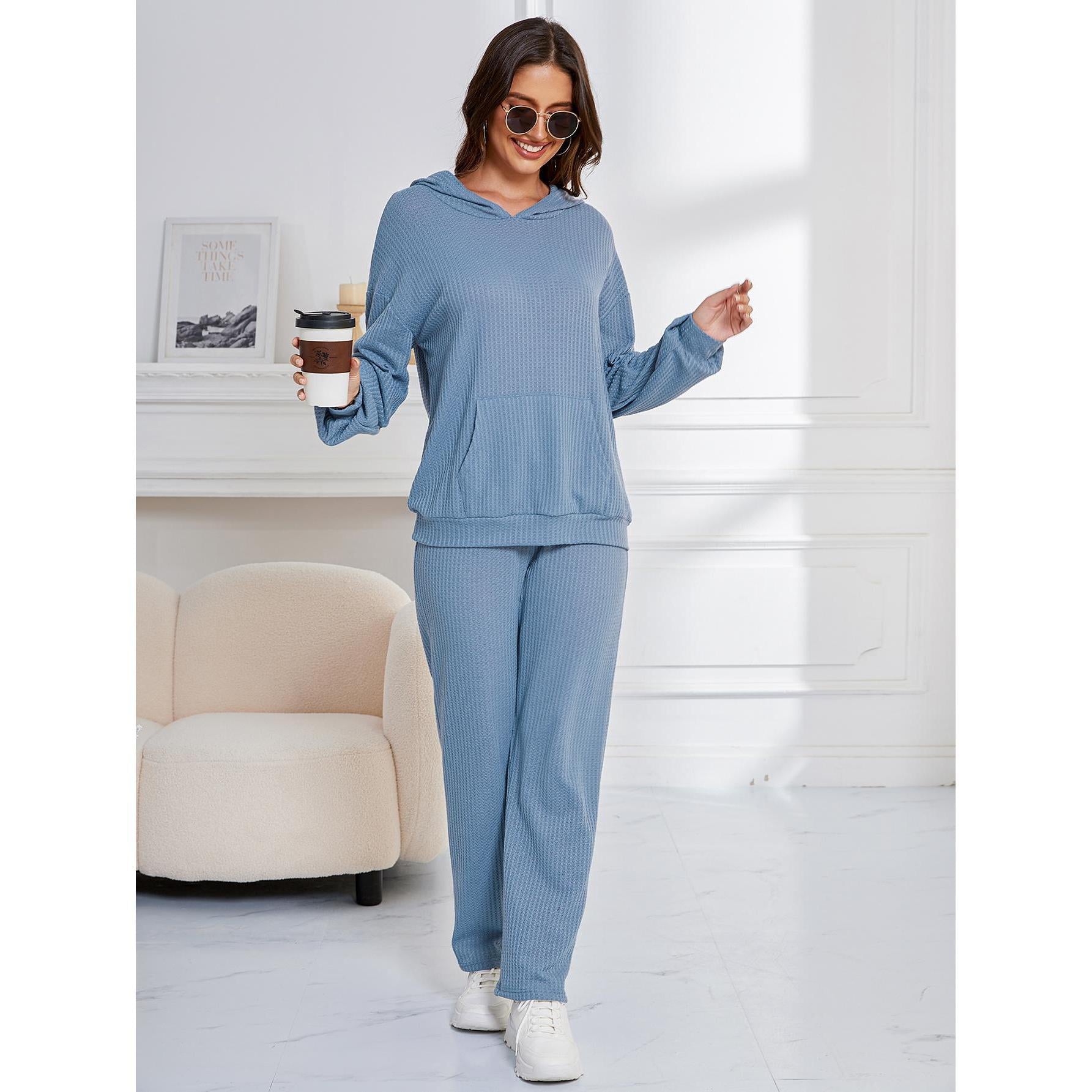 Woman in blue ribbed knit hoodie and pants set, stylish langry ملابس for home wear