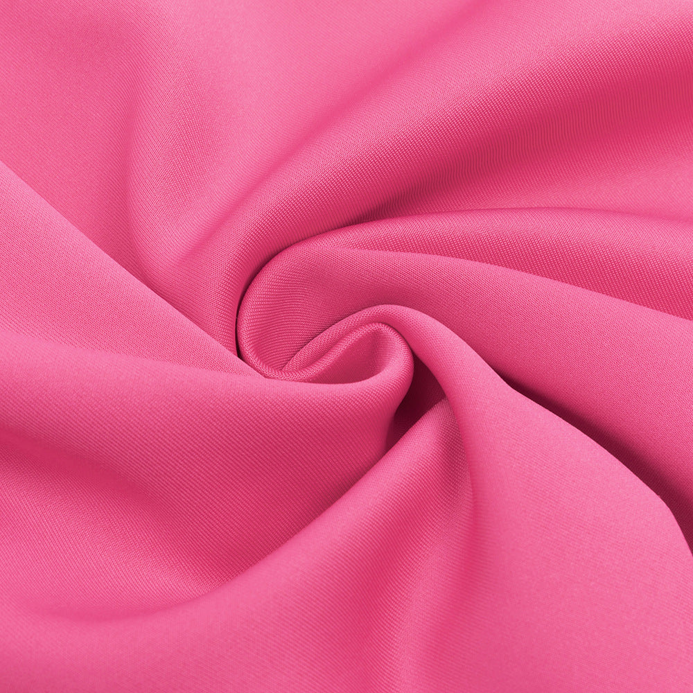 Fuchsia pink jersey knit fabric with soft folds for an elegant shoulder ruffled cocktail dress