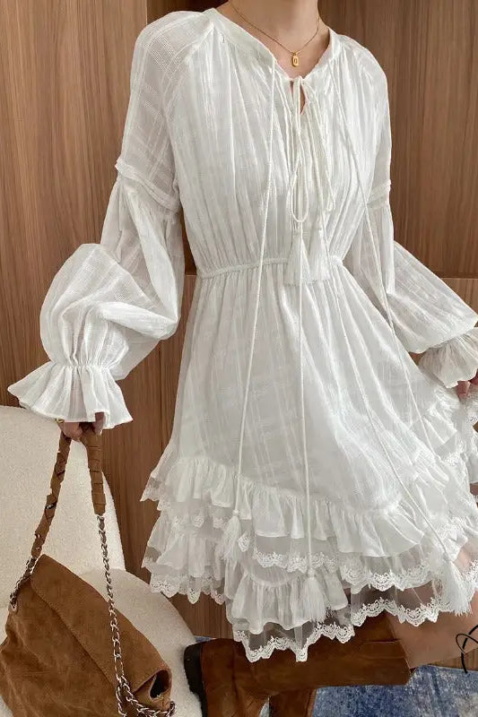 Stunning white ruffled layered dress in Langry fashion