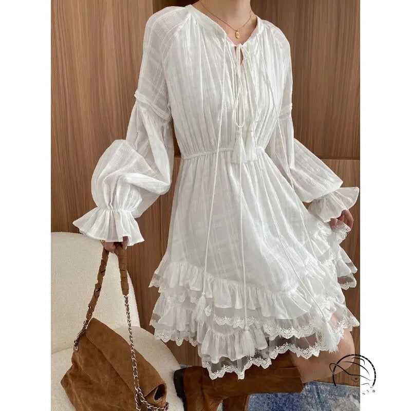 Stunning white ruffled layered dress in Langry fashion