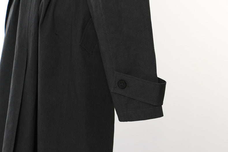 Langry casual trench coat in black with rolled cuffs and buttons