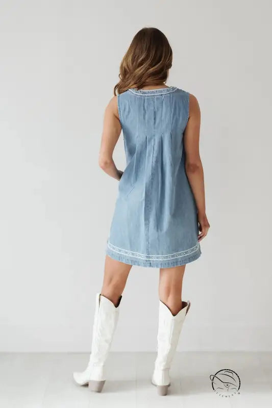 Beautiful embroidered vest denim dress with white trim