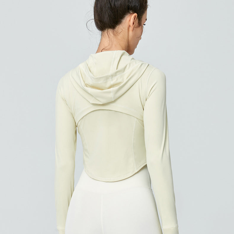 Woman’s long-sleeved hooded athletic top from Sports Long Sleeved Jacket Workout Clothes ملابس