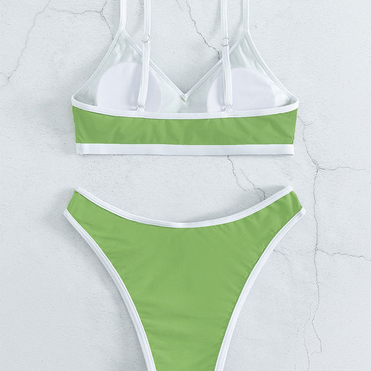 Green and white two-piece swimsuit with solid color stitching and small fresh design