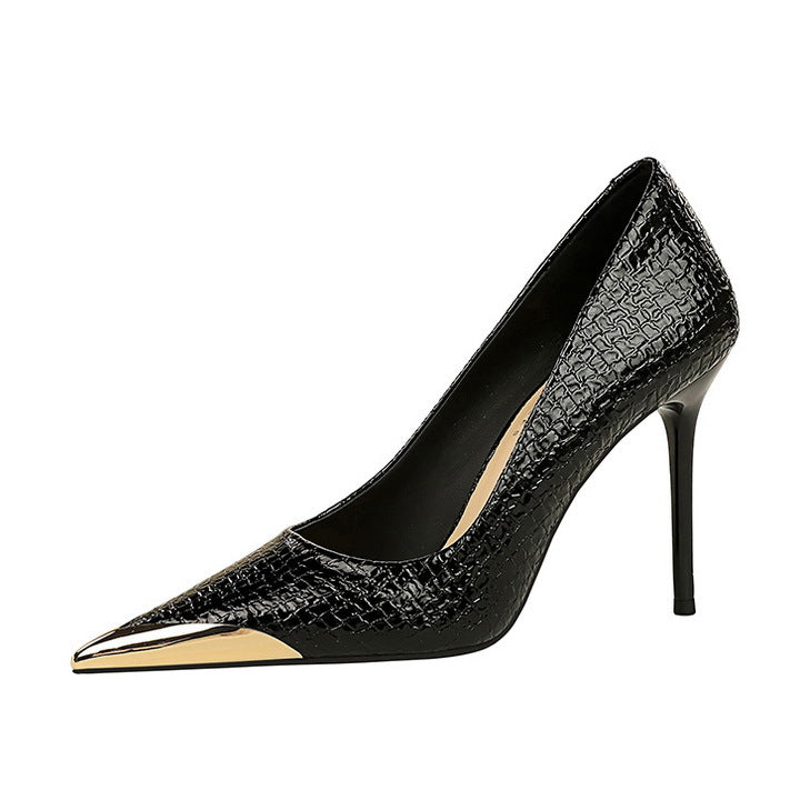 Black stiletto heel with gold toe, perfect for stylish outfits by Langry