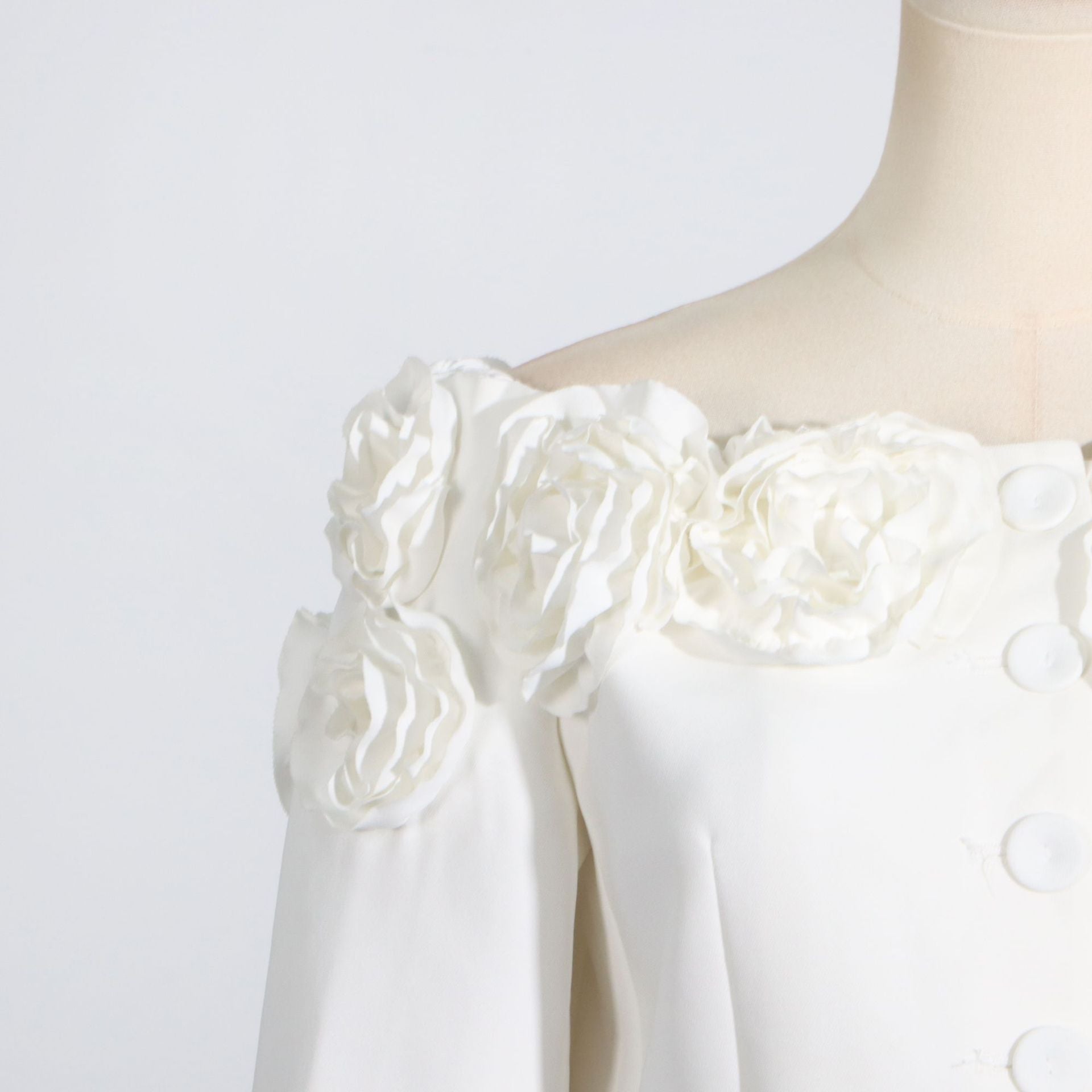 White jacket with floral shoulder embellishments, a stylish addition to Summer off Shoulder Dress