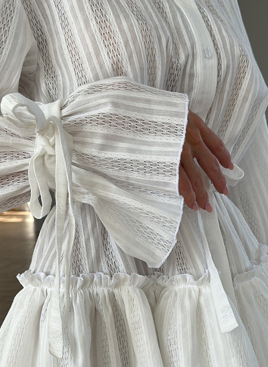 Elegant French Tie ruffled long sleeve short dress in white lace with striped pattern and waist bow