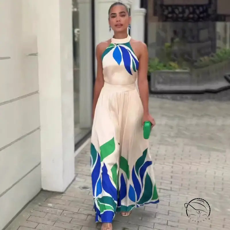 Summer printed off-white halter dress with leaf print and flared shorts