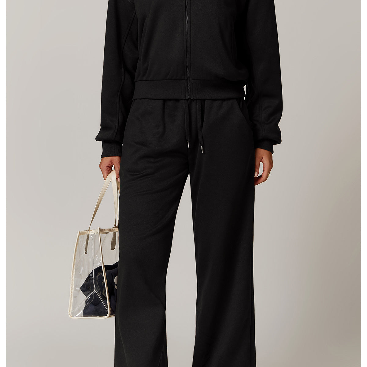 Black lounge set with clear tote, stylish outdoor fashion outfit, versatile ملابس