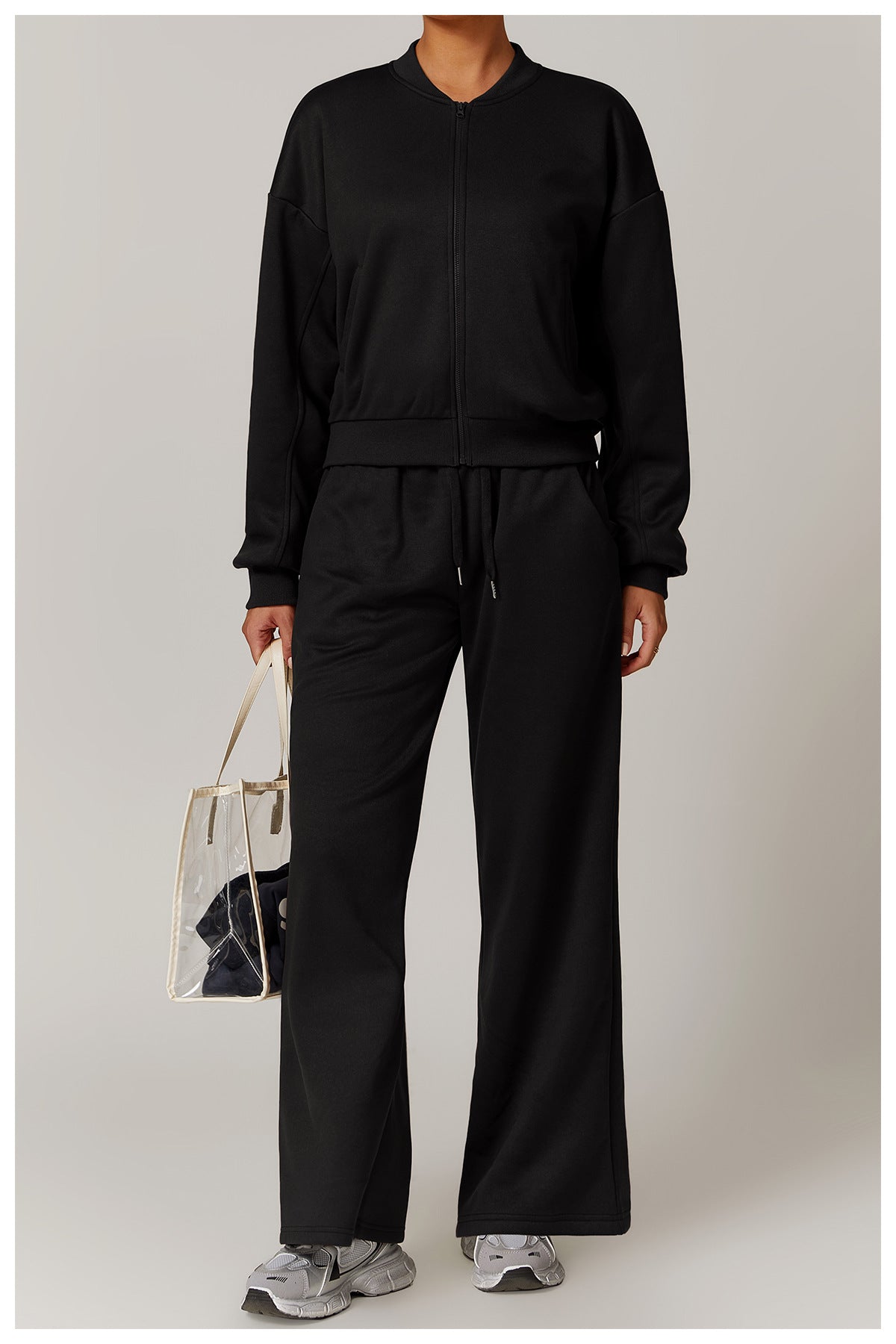 Black lounge set with clear tote, stylish outdoor fashion outfit, versatile ملابس