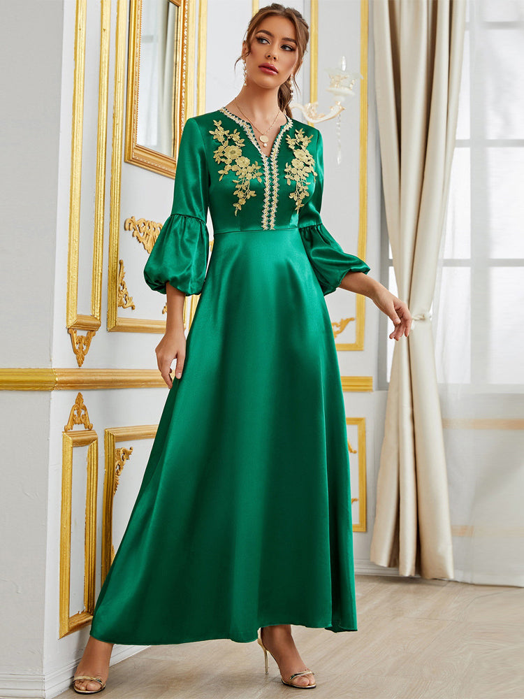 Emerald green Langry satin fashion dress with gold embroidery and bell sleeves