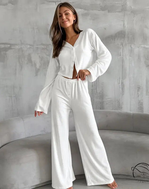 Smiling woman in knitted loose comfort pajamas set