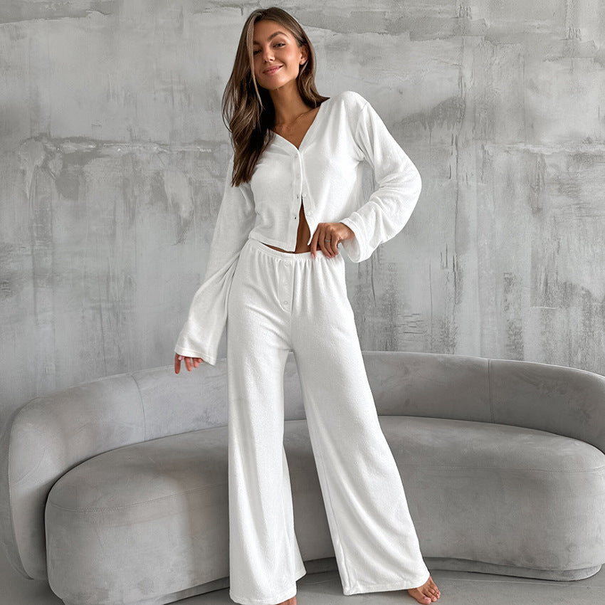 Woman in white knitted loose comfort pajamas from Knitted Loose Comfort collection