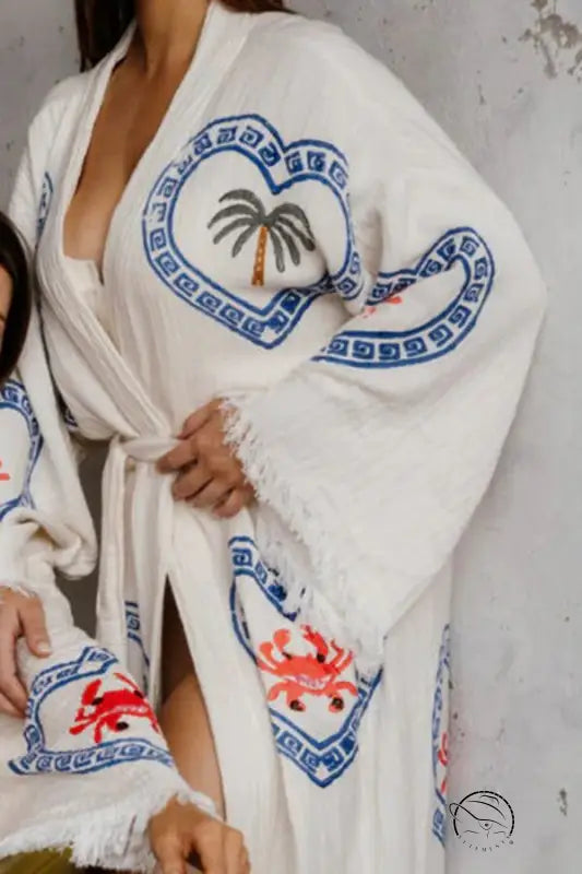 White loose positioning printed coat with blue heart and crab embroidery