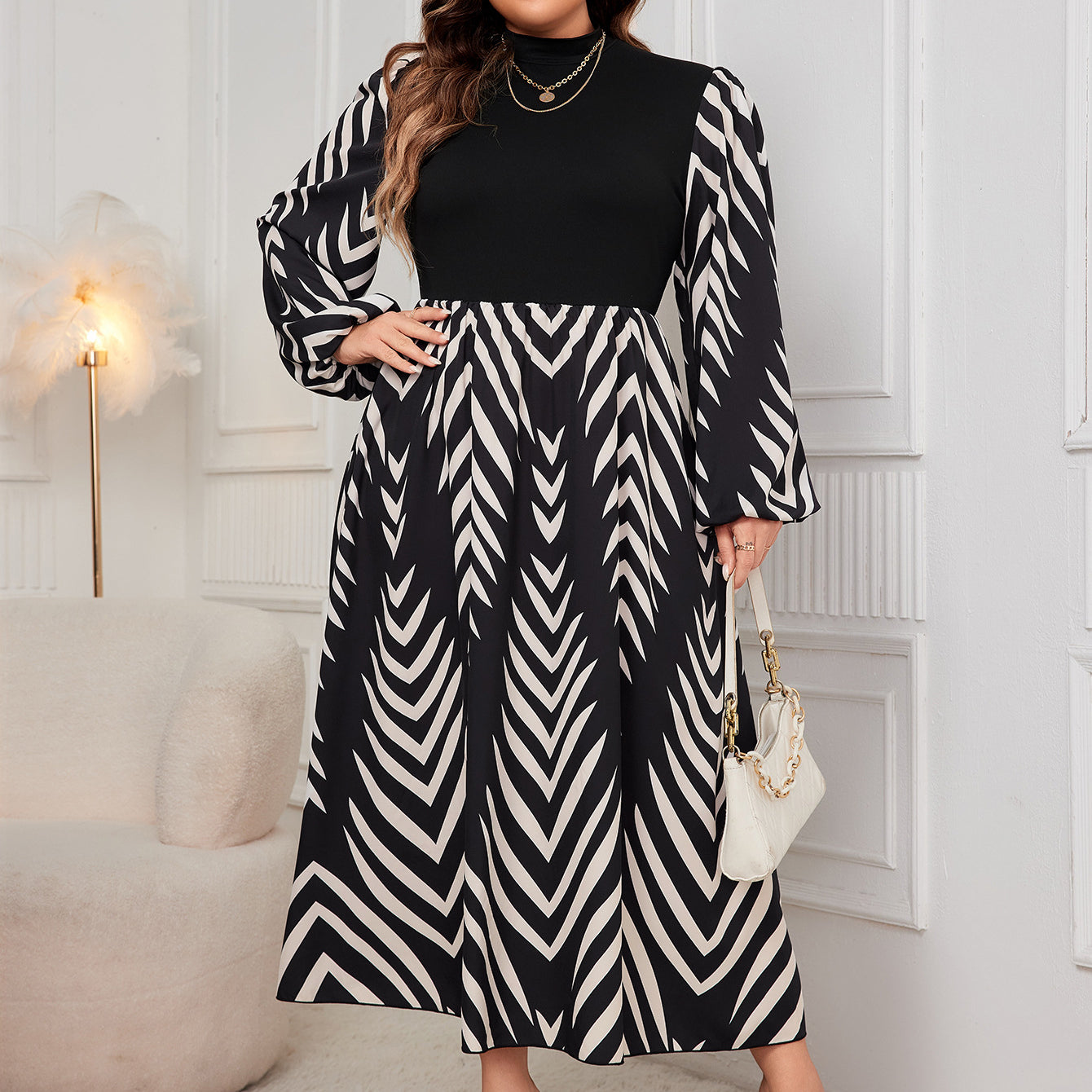 Elegant Puff Sleeve High Waist Dress featuring a stylish black and white pattern in ملابس