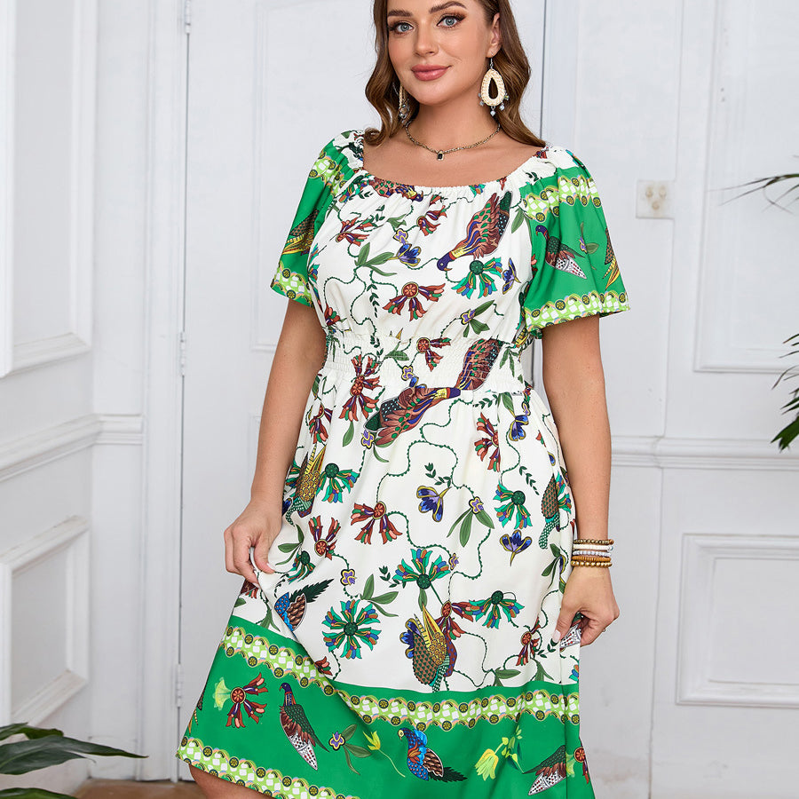 Elegant bohemian dress for women featuring floral and bird print, short puff sleeves