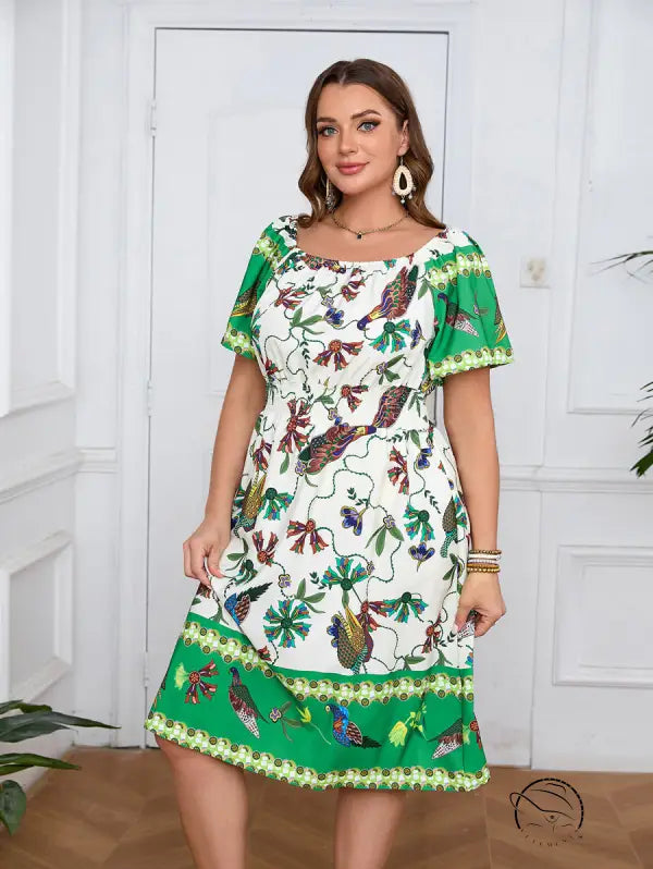 Elegant bohemian dress: plus-size midi with floral bird print, puff sleeves