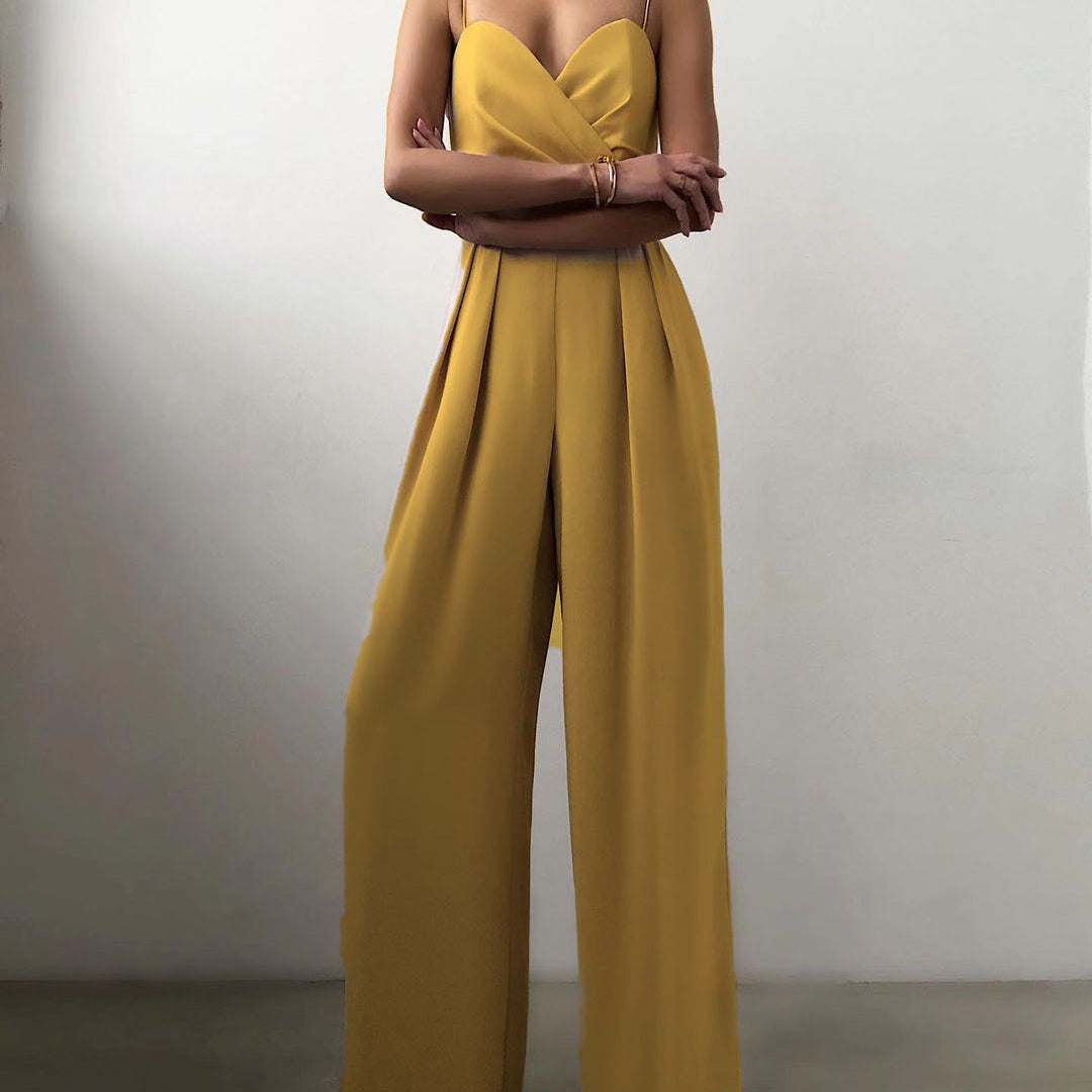 Mustard yellow strapless jumpsuit with pleated wide-leg pants for modern fashion ملابس