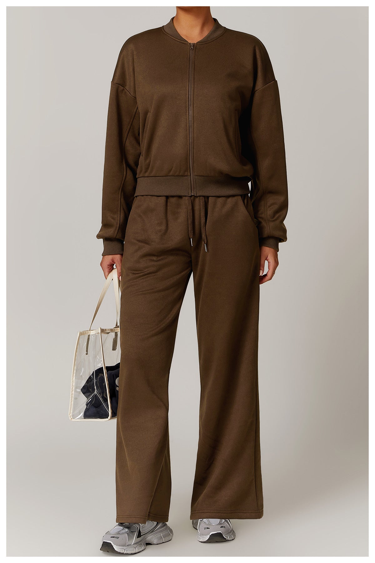 Brown tracksuit with a clear tote bag, perfect for outdoor warm sports fashion enthusiasts