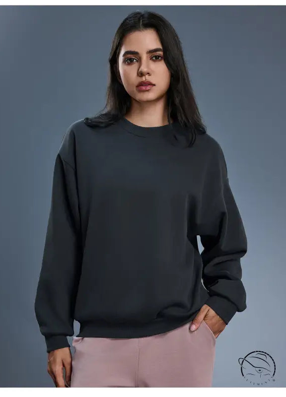 Charcoal gray long sleeve cotton blend crewneck sweatshirt with ribbed cuffs