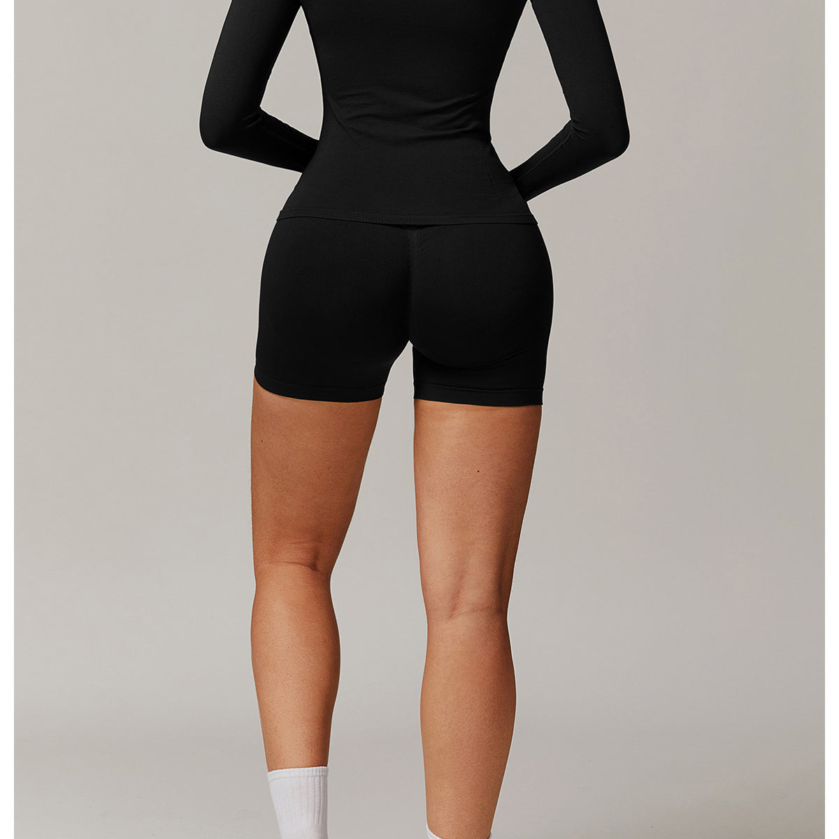 Black athletic long sleeve top from the Running Sport collection, stylish and functional fashion