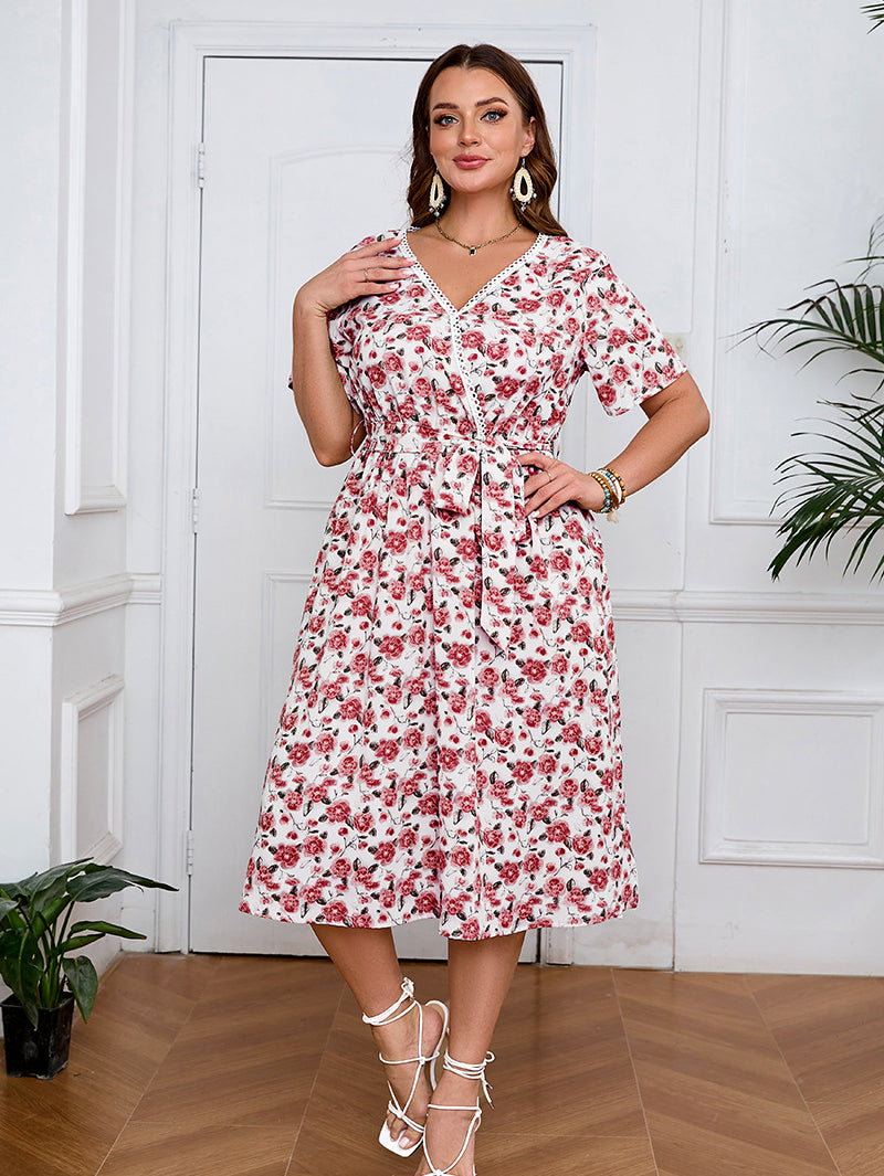 White boho lace floral midi dress with short sleeves, V-neckline, and tie waist
