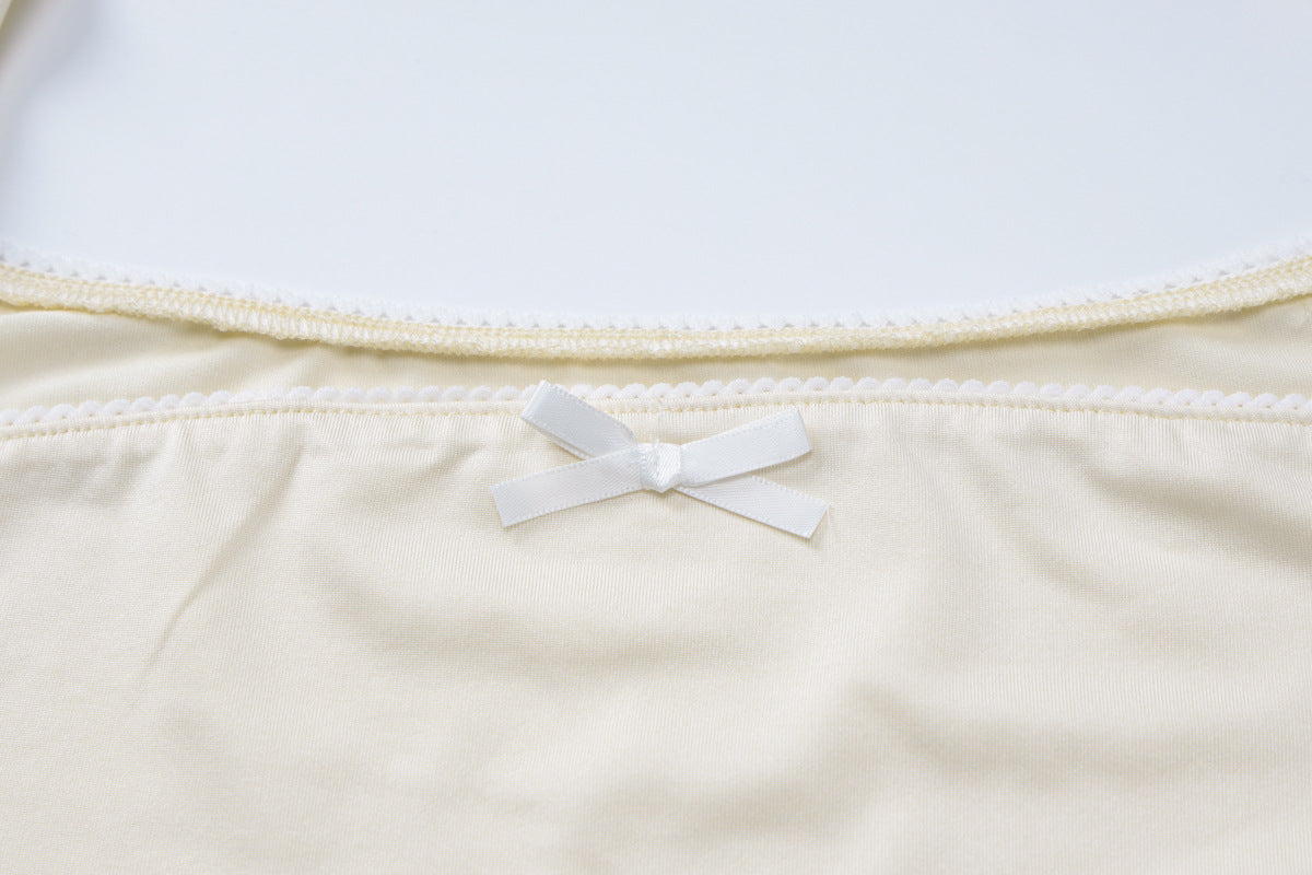 Cream-colored underwear with a white bow from the Long Sleeve Autumn Lace Set