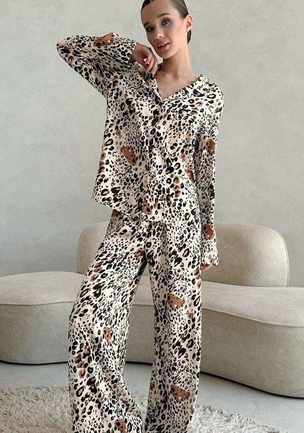 Beautiful langry leopard print satin pajama set with long sleeves and wide-leg pants in fashion ملابس