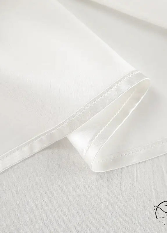 Crisp white ice silk blouse in langry fashion pajamas