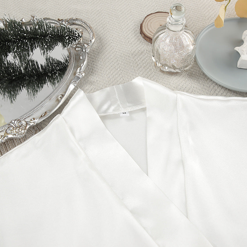 White satin robe with V-neck and tie closure, part of Comfortable Silk Feather Nightgown collection