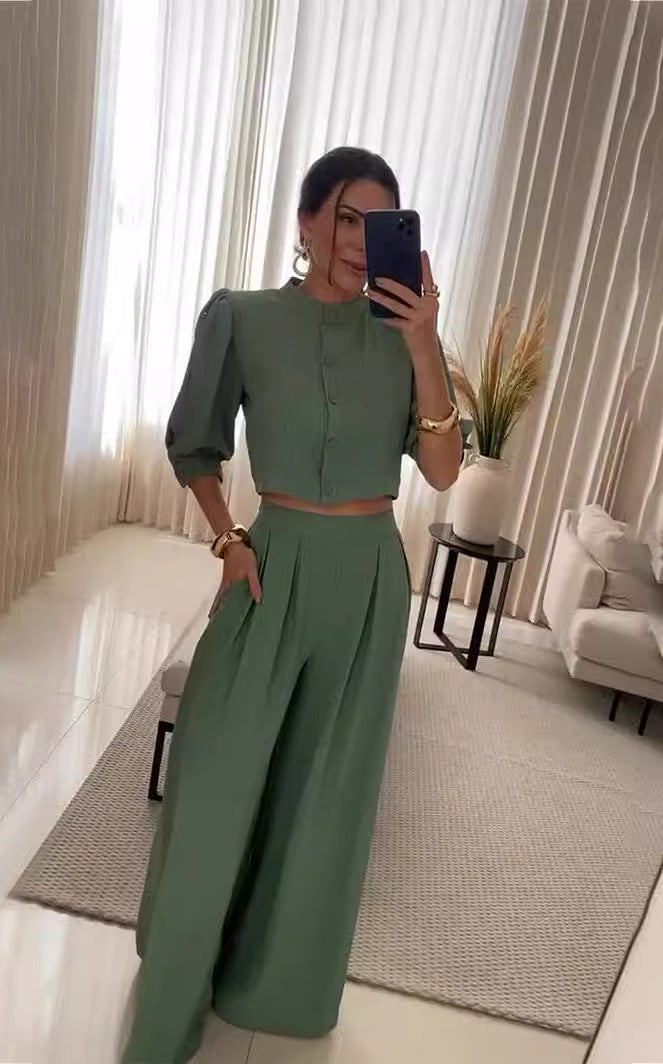 Fashionable woman in a green two-piece outfit from Summer Striped Half Sleeve Top Trousers Suit Women Clothing collection